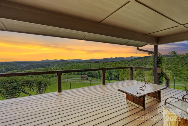 a view of a patio with wooden floor