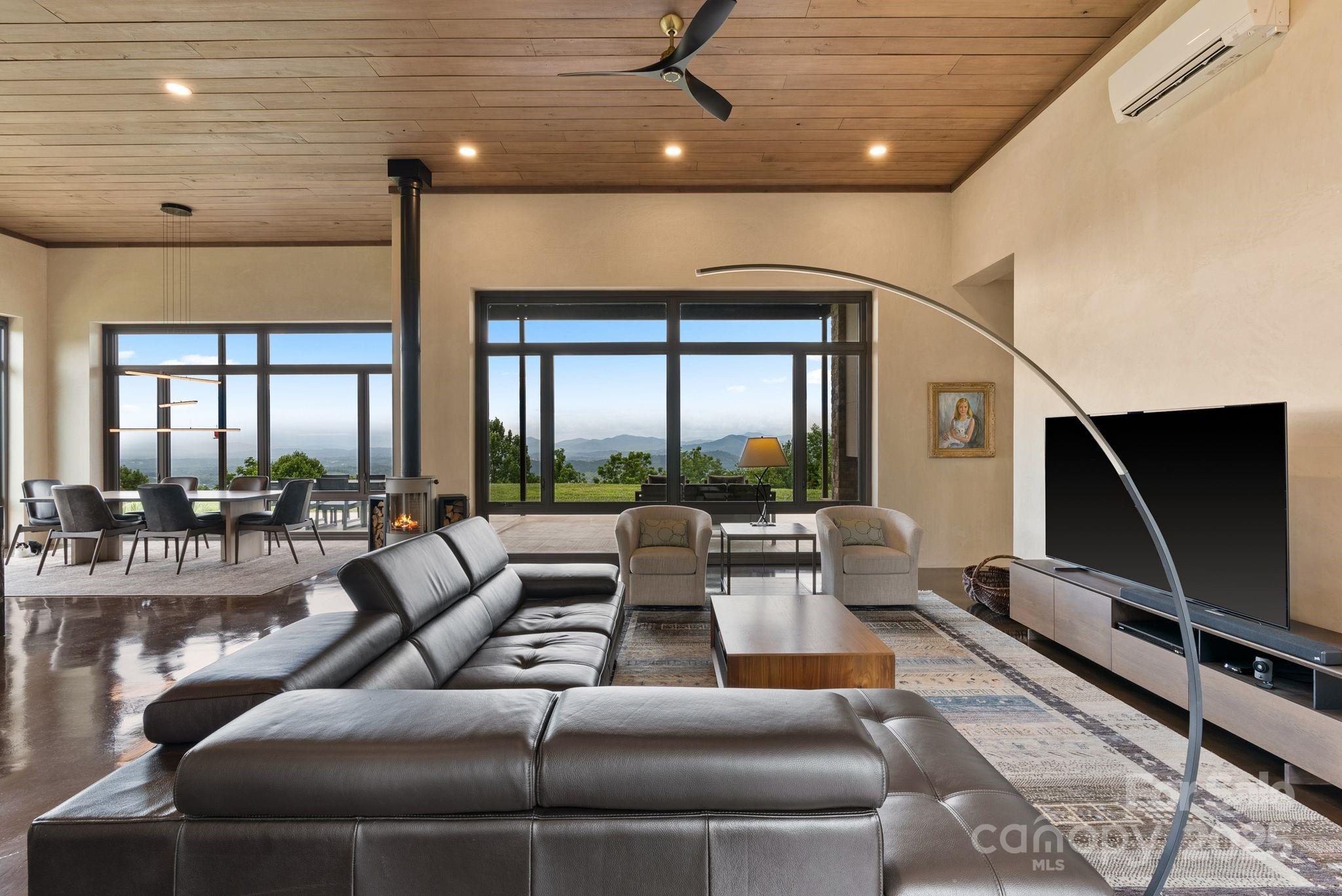 1045 Graham Road Marshall, NC 28753 - Photo 5 of 48 a living room with furniture and a flat screen tv