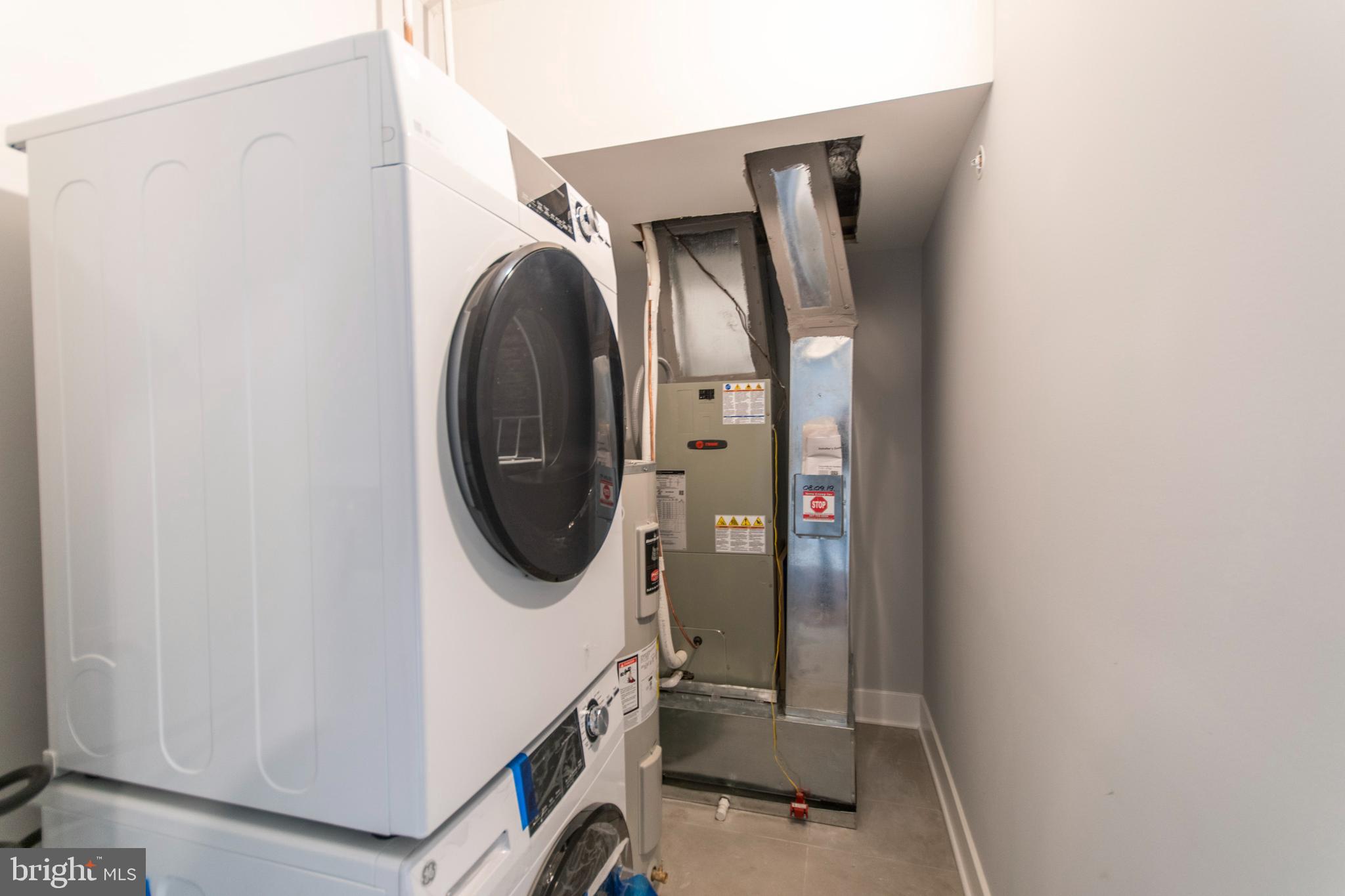 812 North Uber Street, Unit 6 Philadelphia, PA 19130 - Photo 20 of 25 a utility room with dryer and washer