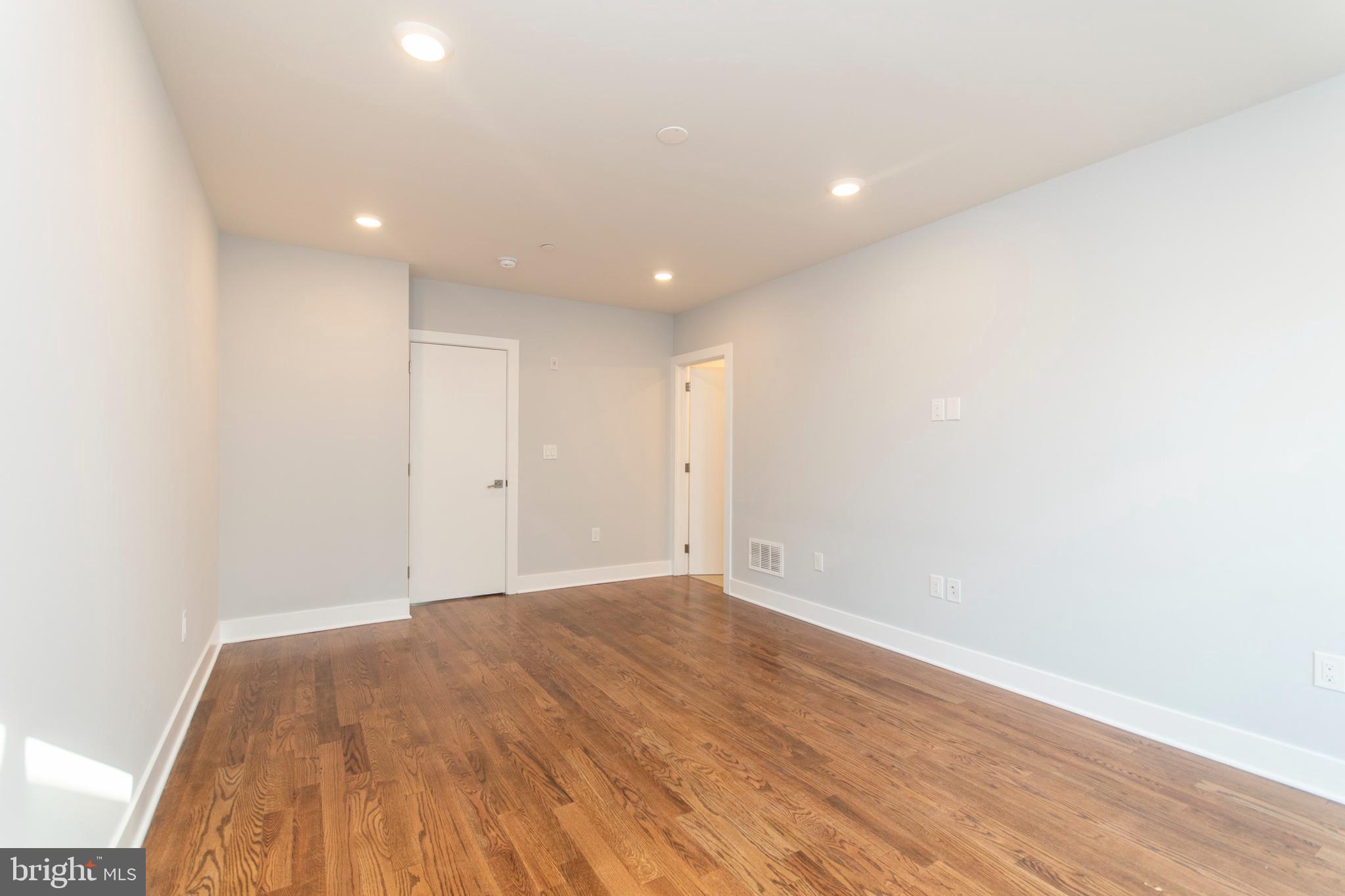 812 North Uber Street, Unit 6 Philadelphia, PA 19130 - Photo 8 of 25 a view of empty room with wooden floor