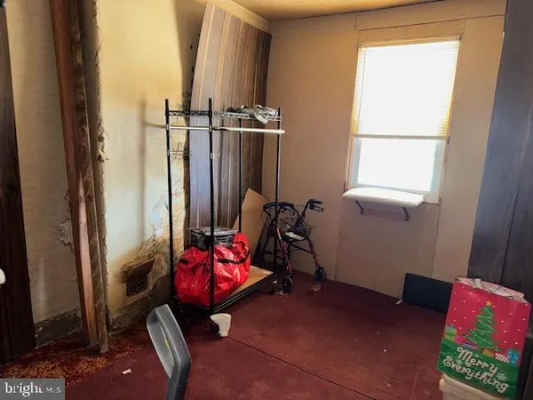 a room with furniture and a window