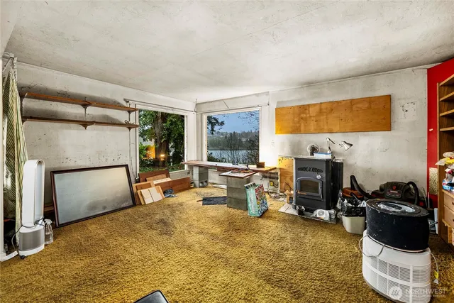 a room with furniture and a large window