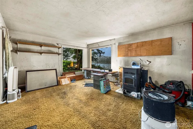 a view of a living room with a large window