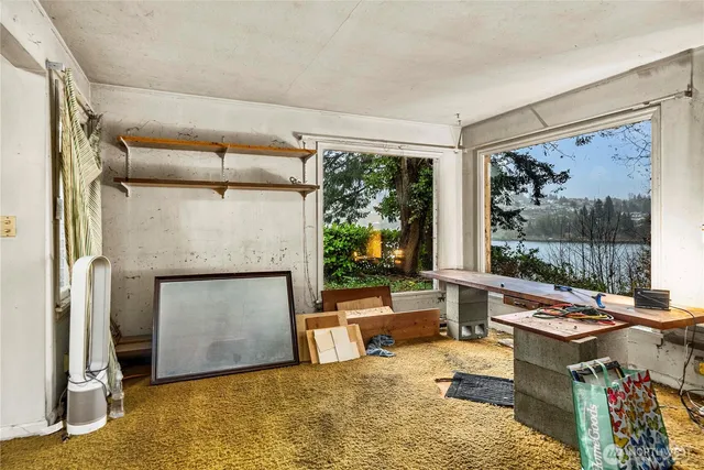 a room with furniture and a window