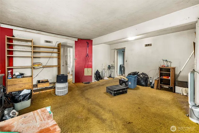 a bedroom with a workspace