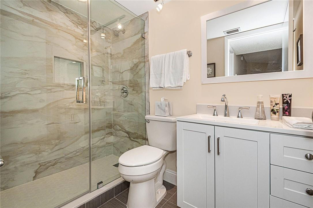 620 South Park Road, Unit 213 Hollywood, FL 33021 - Photo 11 of 28 a bathroom with a sink a toilet and shower