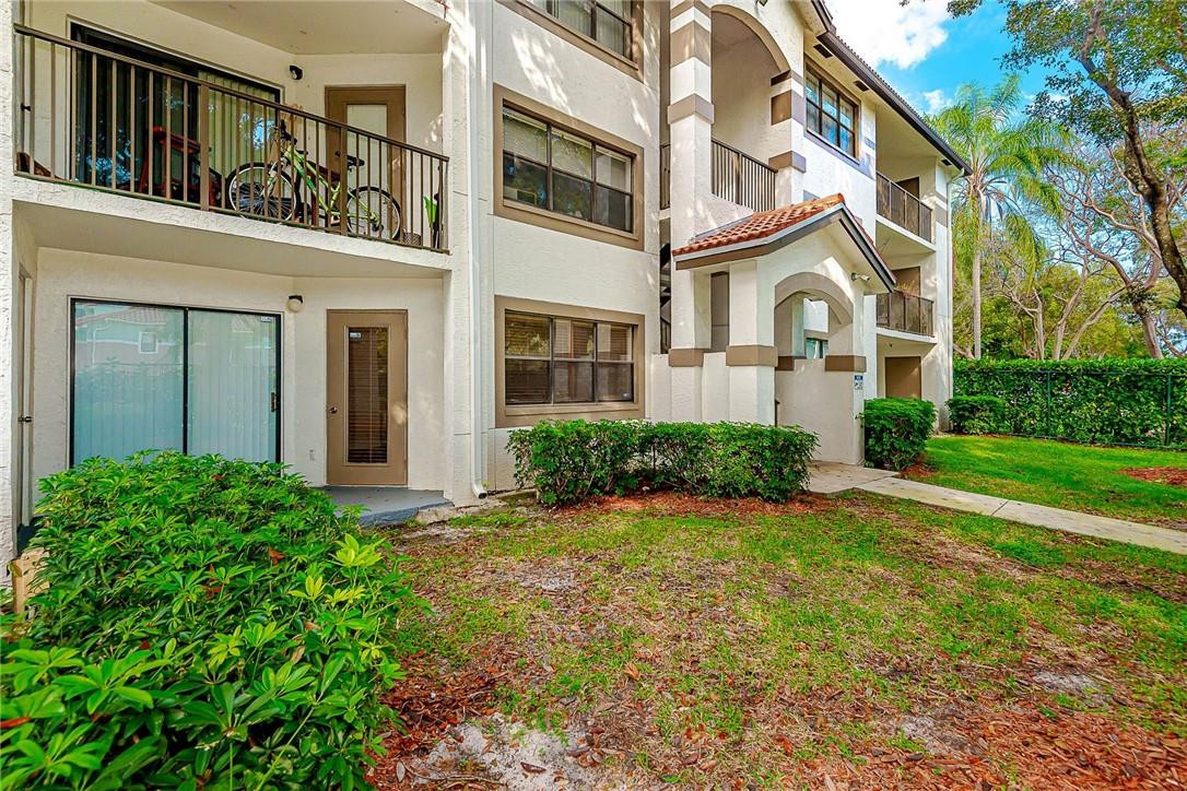 620 South Park Road, Unit 213 Hollywood, FL 33021 - Photo 20 of 28 front view of a house with a yard