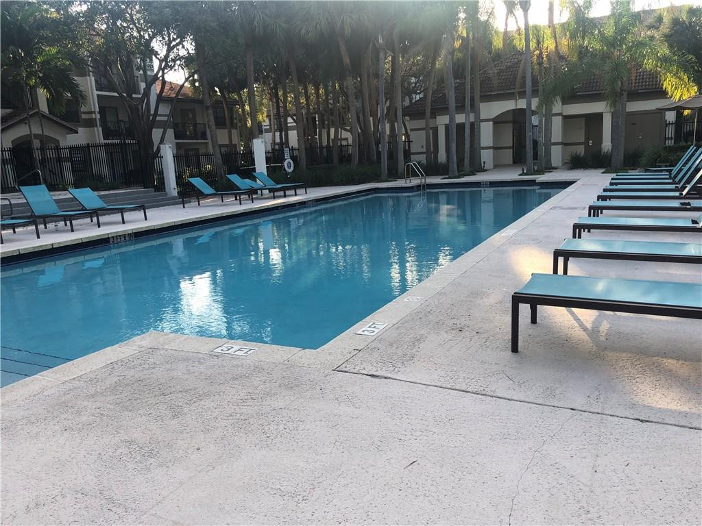 620 South Park Road, Unit 213 Hollywood, FL 33021 - Photo 24 of 28 a view of a lake with sitting area
