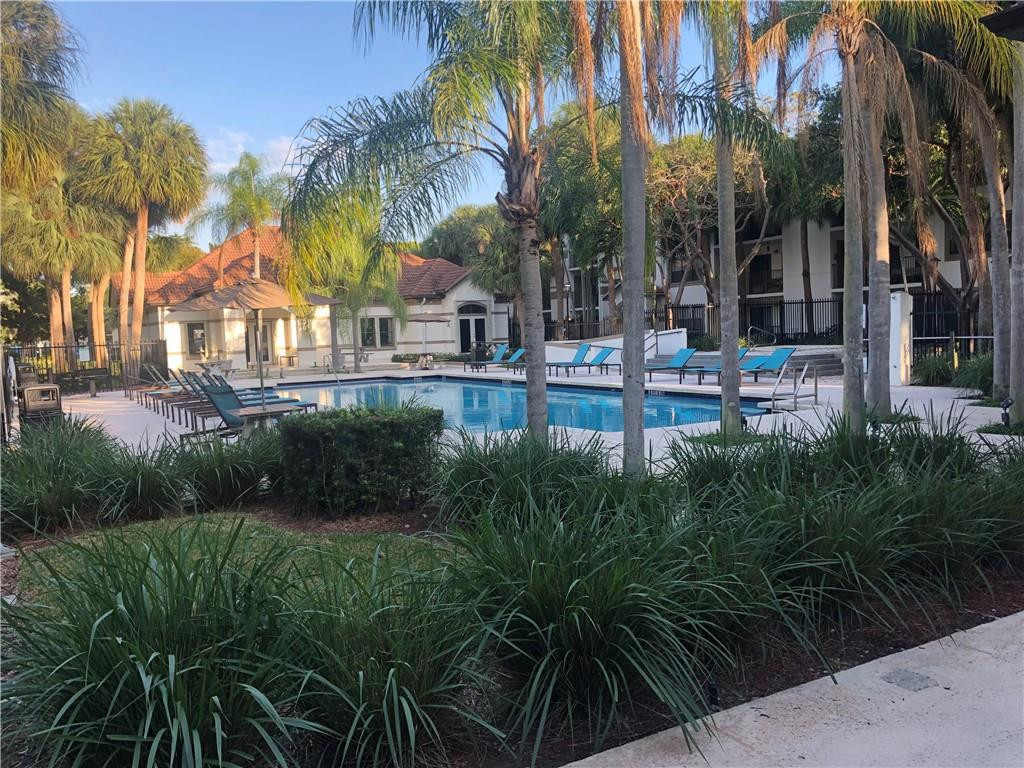 620 South Park Road, Unit 213 Hollywood, FL 33021 - Photo 25 of 28 a view of a house with a yard and sitting area