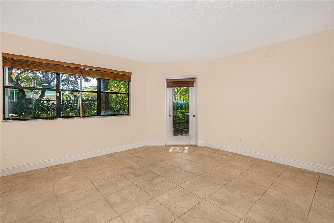 620 South Park Road, Unit 213 Hollywood, FL 33021 - Photo 9 of 28 an empty room with windows