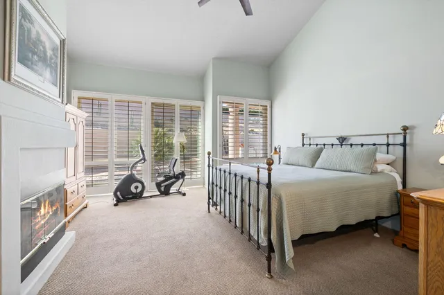 a bedroom with a bed and a cabinets