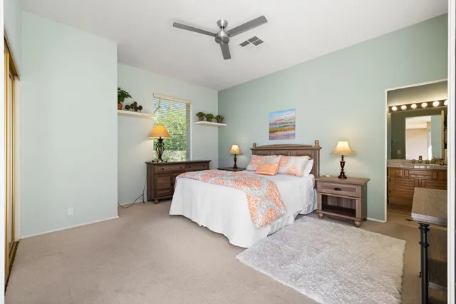 a front view of a house with outdoor seating