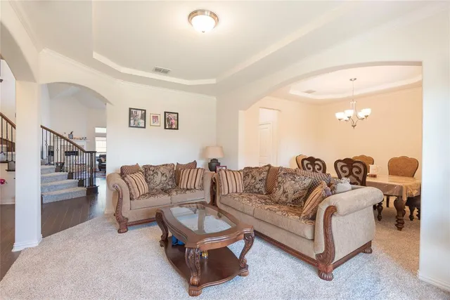 a living room with furniture and a couch