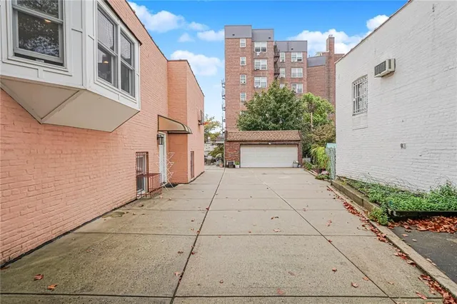 a view of a patio with couches and potted plants