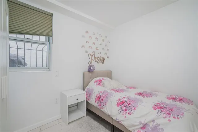 a kitchen with a stove a sink and a refrigerator