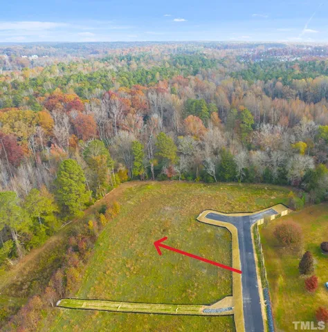 a view of swimming pool with a yard
