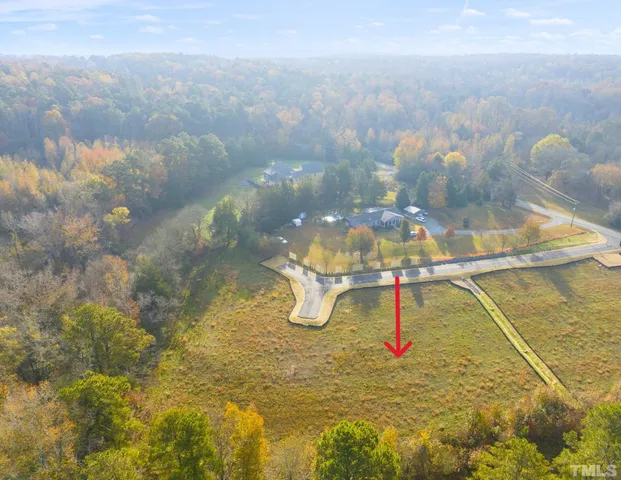 a view of swimming pool and mountain in the background