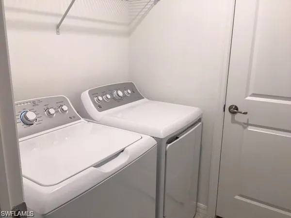 a bathroom with a shower and a toilet