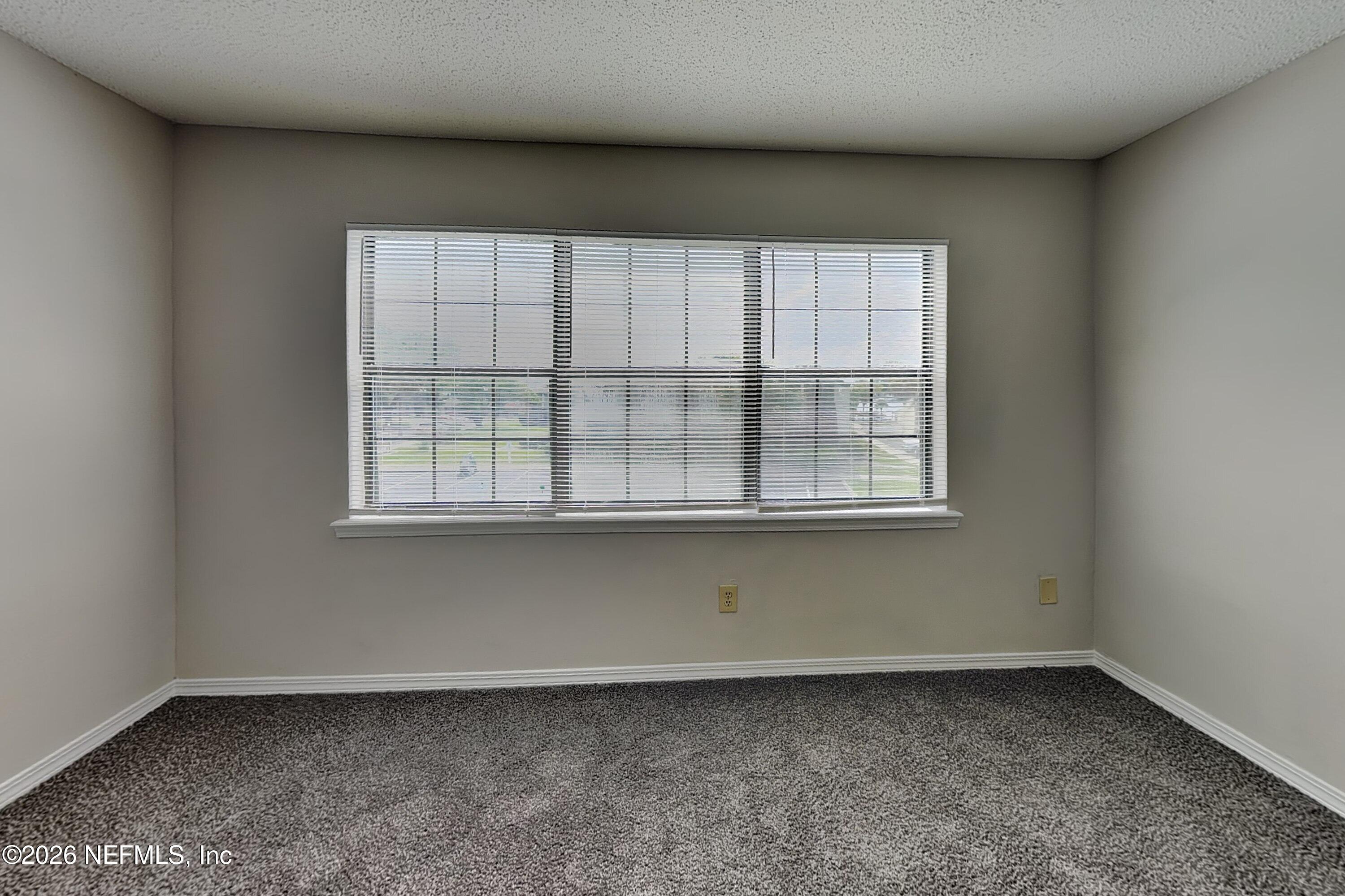 5332 Fort Caroline Road Jacksonville, FL 32277 - Photo 11 of 24 10_Primary_Bedroom-01_pc_aXc1r3fuk2_zArv