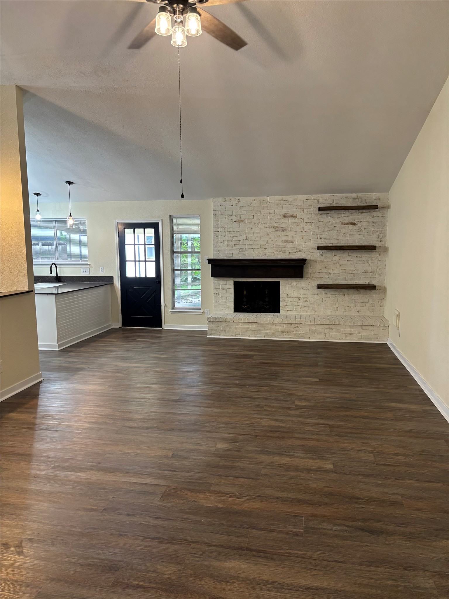 23726 Farm Hill Drive Spring, TX 77373 - Photo 5 of 11 a view of a kitchen with microwave and cabinets