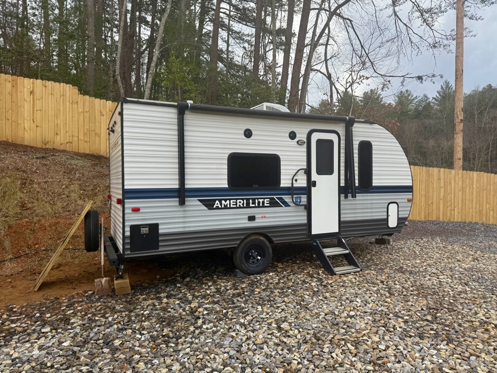 954 Croft Chapel Road Turtletown, TN 37391 - Photo 4 of 8 a view of a back yard of the house with a bench