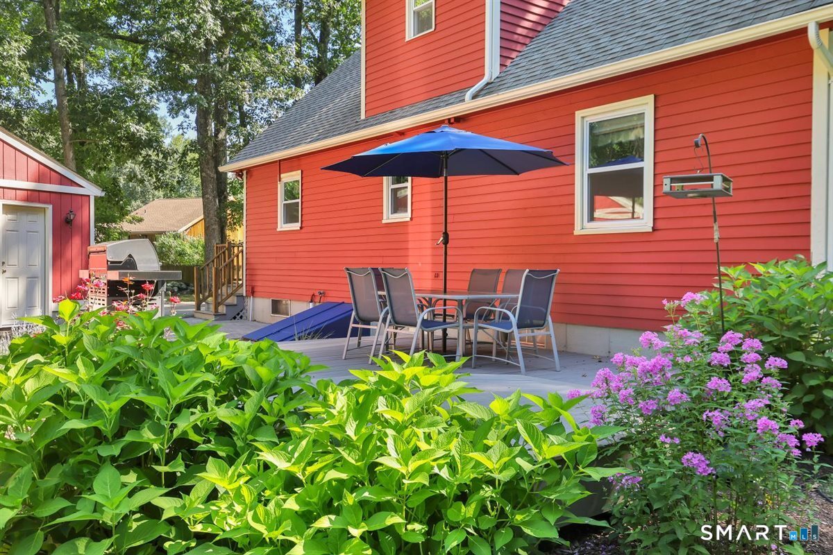 328 Bulkeley Hill Road Colchester, CT 06415 - Photo 32 of 40 Gardens surround the deck
