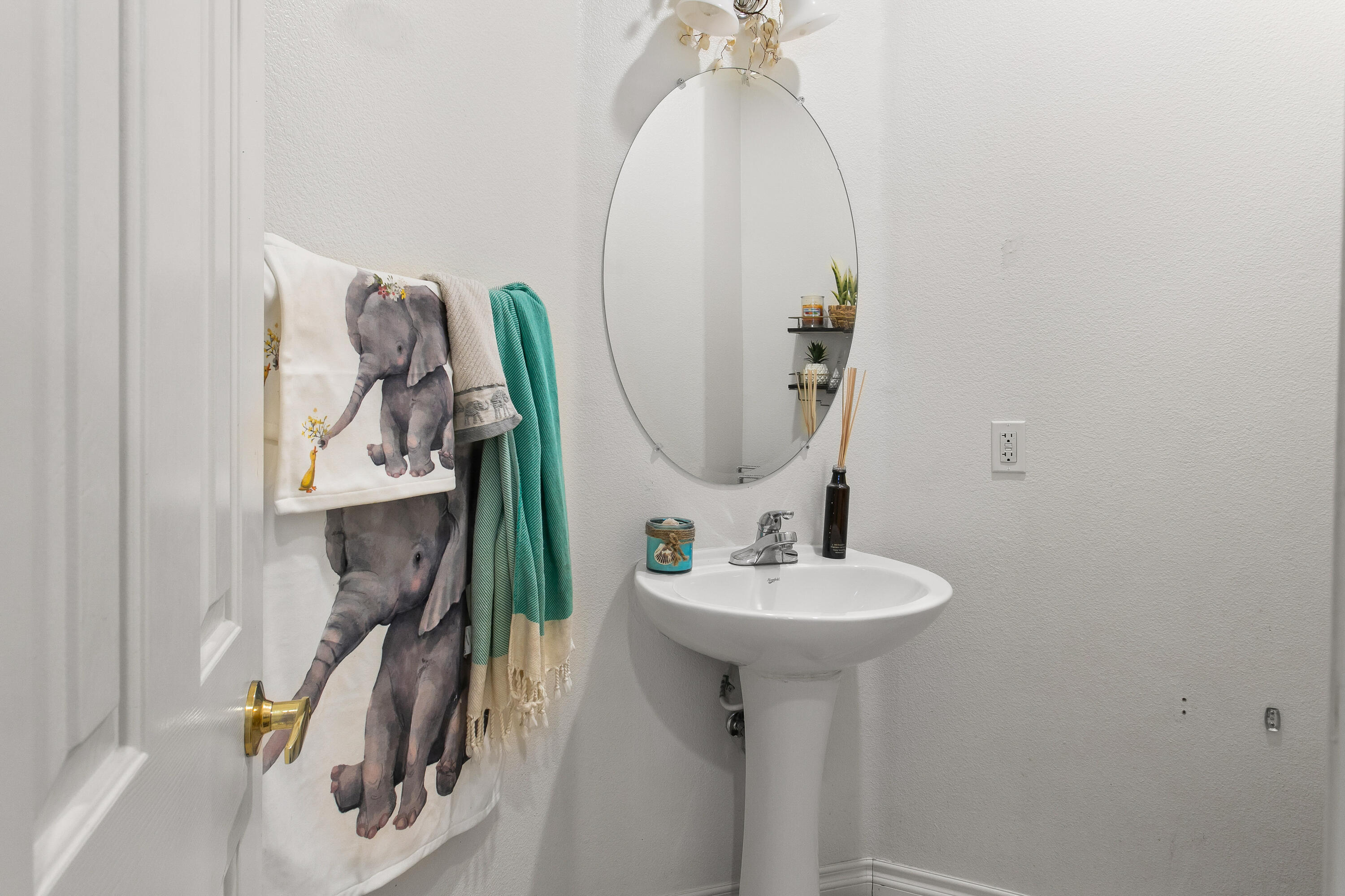 49870 Lewis Road Indio, CA 92201 - Photo 34 of 47 a bathroom with a sink a mirror and a shower