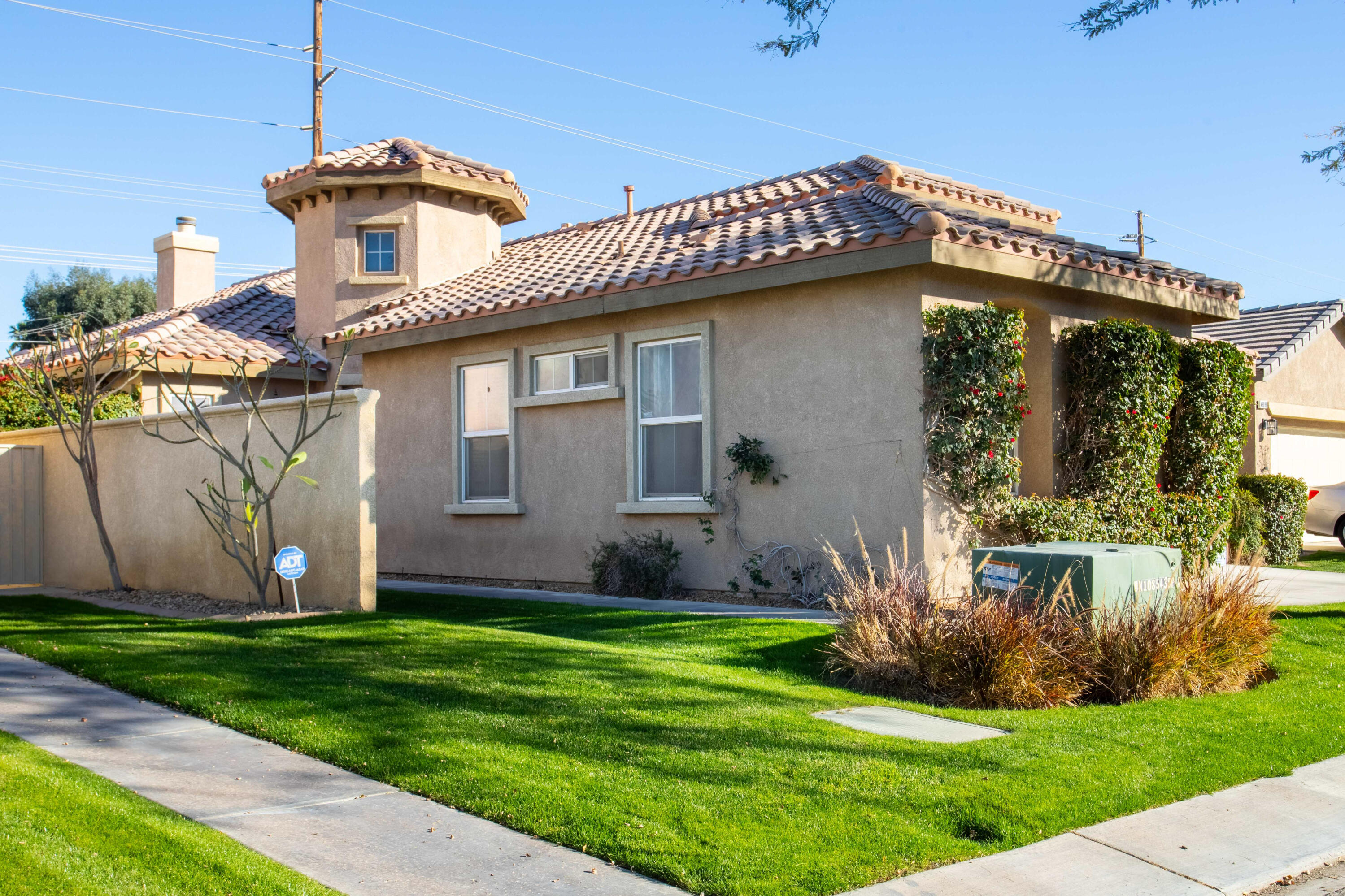 49870 Lewis Road Indio, CA 92201 - Photo 42 of 47 a front view of a house with a yard