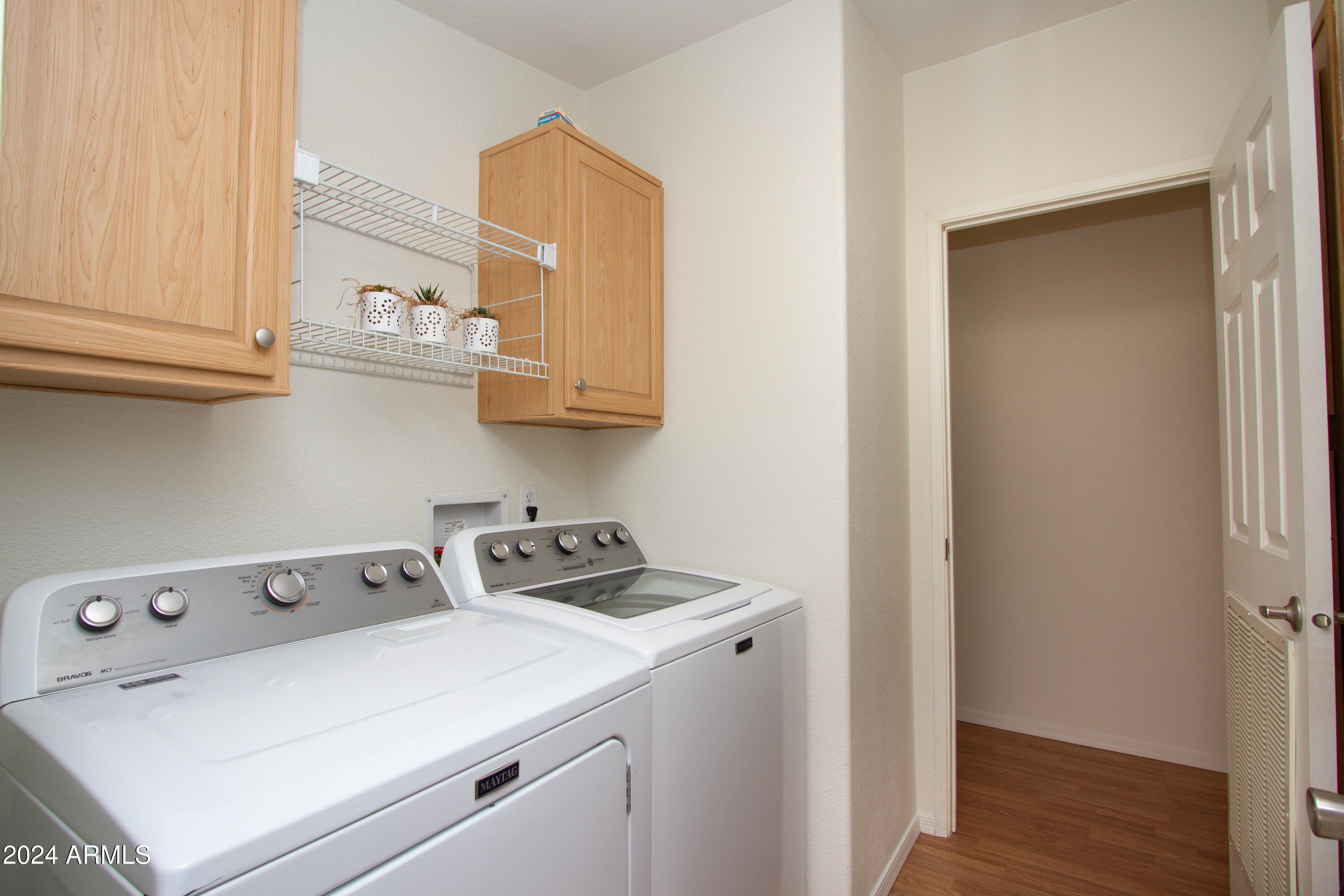 3700 South Tomahawk Road, Unit 93 Apache Junction, AZ 85119 - Photo 33 of 40 a room with storage and utility