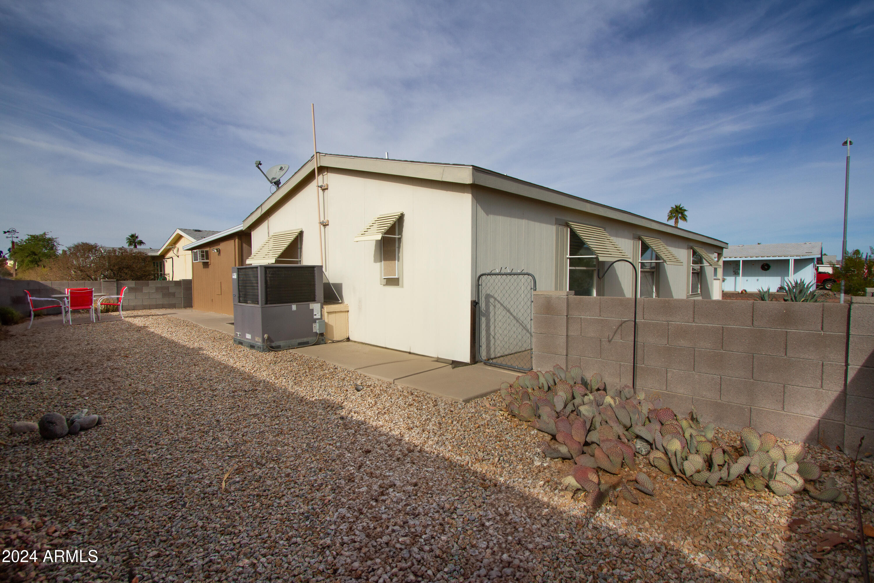 3700 South Tomahawk Road, Unit 93 Apache Junction, AZ 85119 - Photo 34 of 40 a view of a house with a house
