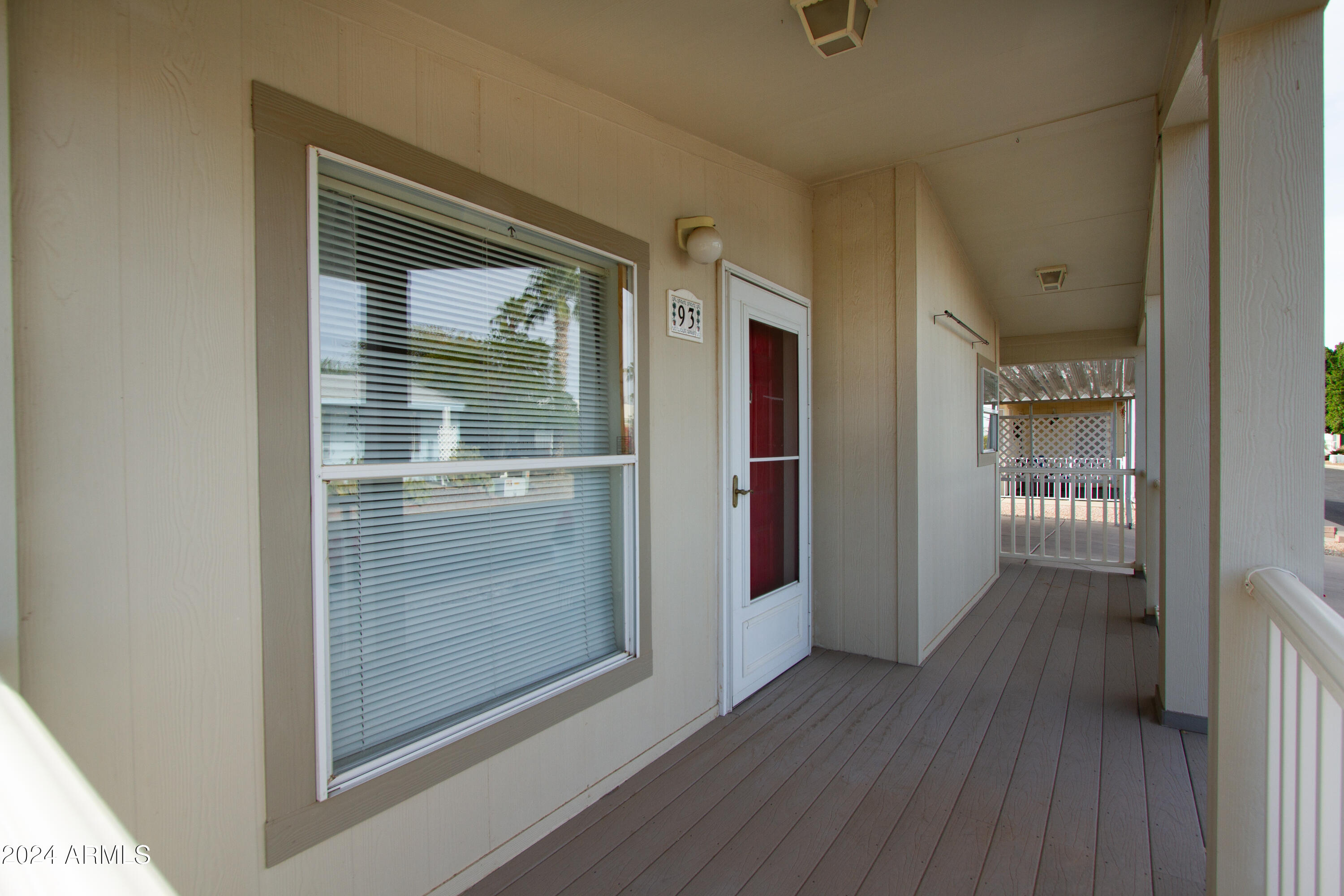 3700 South Tomahawk Road, Unit 93 Apache Junction, AZ 85119 - Photo 9 of 40 a view of elevator with hallway