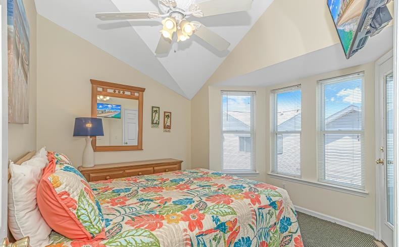 1171 Neptune Road Myrtle Beach, SC 29577 - Photo 11 of 29 Bedroom with carpet flooring, ceiling fan, and lofted ceiling