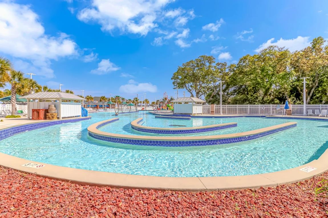 1171 Neptune Road Myrtle Beach, SC 29577 - Photo 25 of 29 Community pool with a patio area
