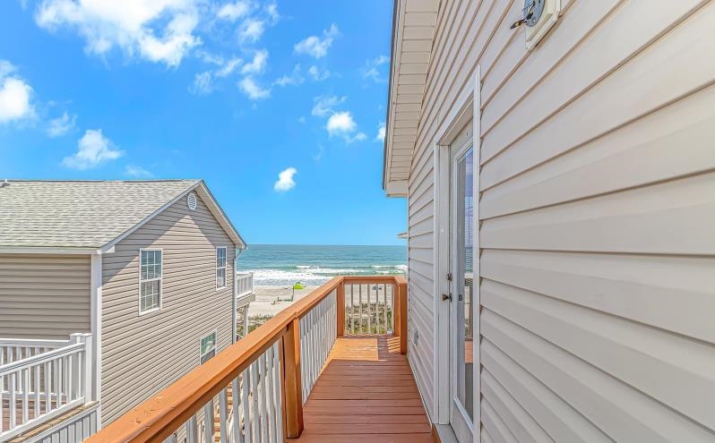 1171 Neptune Road Myrtle Beach, SC 29577 - Photo 4 of 29 Balcony featuring view of water and beach