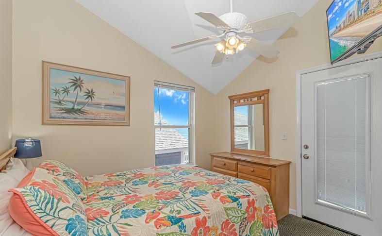 1171 Neptune Road Myrtle Beach, SC 29577 - Photo 9 of 29 Bedroom featuring vaulted ceiling and ceiling fan