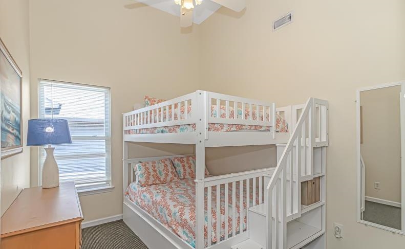 1171 Neptune Road Myrtle Beach, SC 29577 - Photo 10 of 29 Carpeted bedroom featuring ceiling fan and baseboards