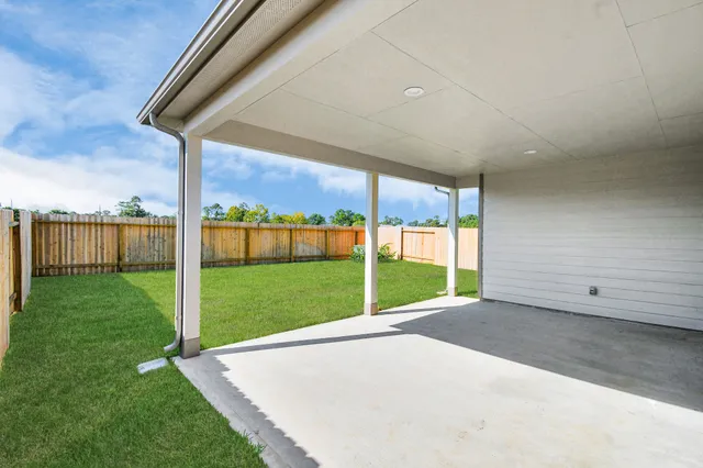 a view of a hallway with a white walls