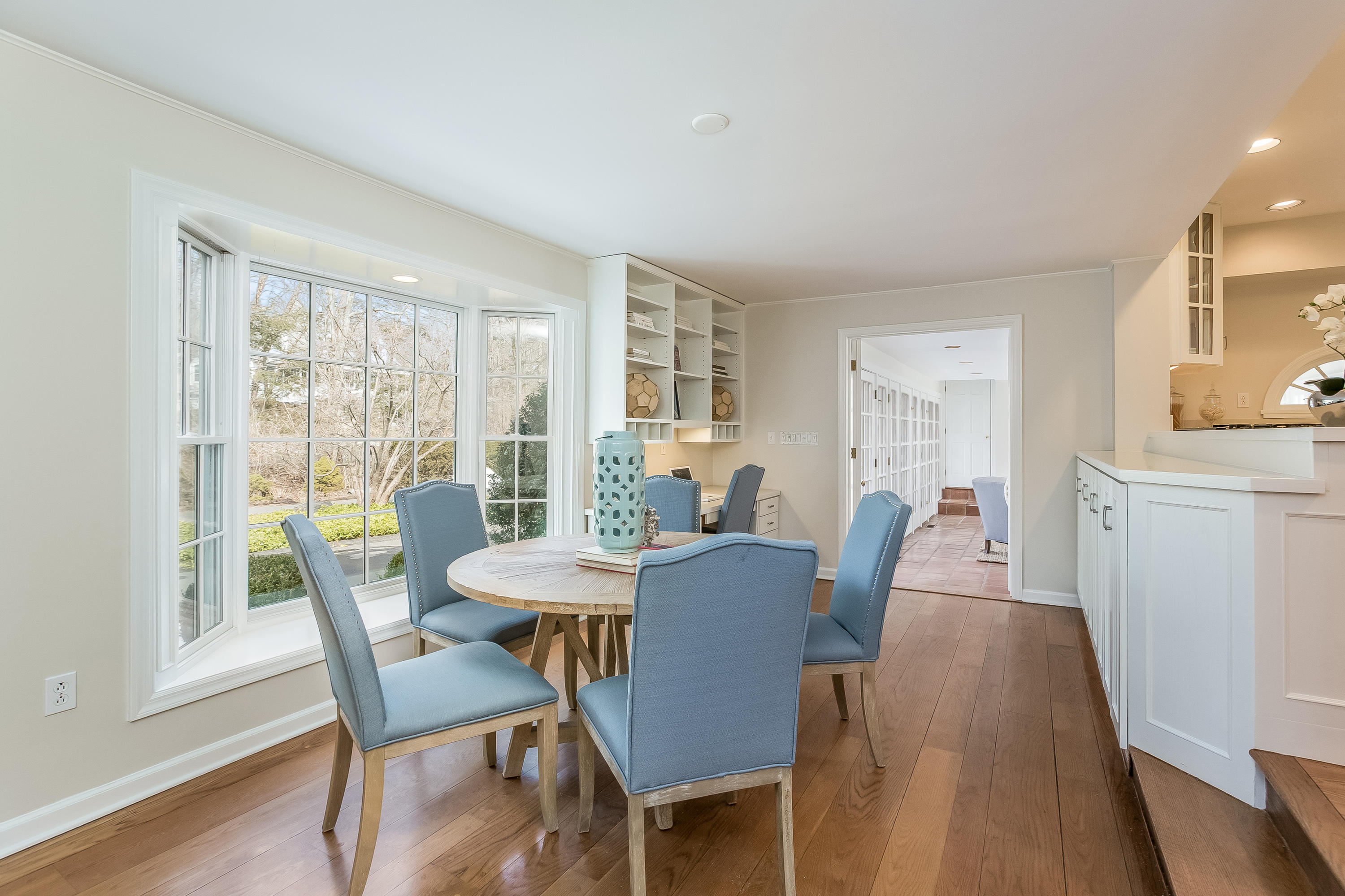 14 Meadowbrook Road Darien, CT 06820 - Photo 15 of 40 a view of a dining room with furniture window and wooden floor