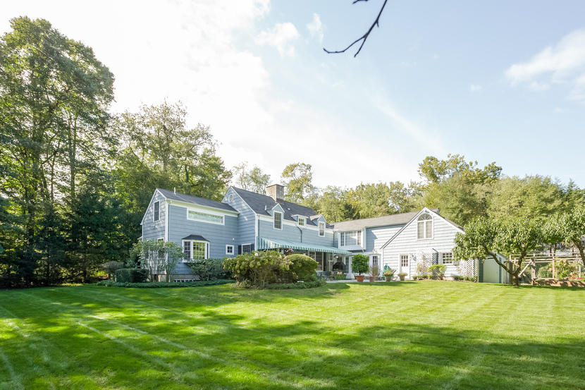 14 Meadowbrook Road Darien, CT 06820 - Photo 31 of 40 a front view of house with yard and trees
