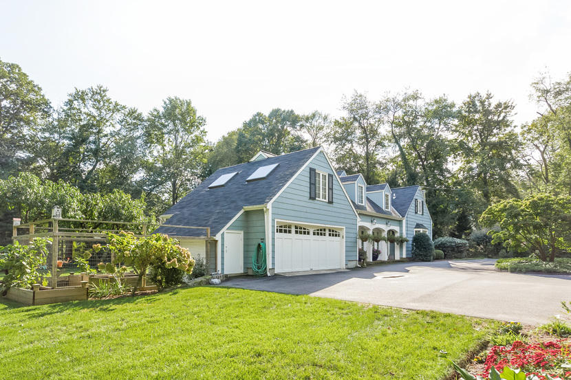 14 Meadowbrook Road Darien, CT 06820 - Photo 38 of 40 a view of a house with a yard and garage