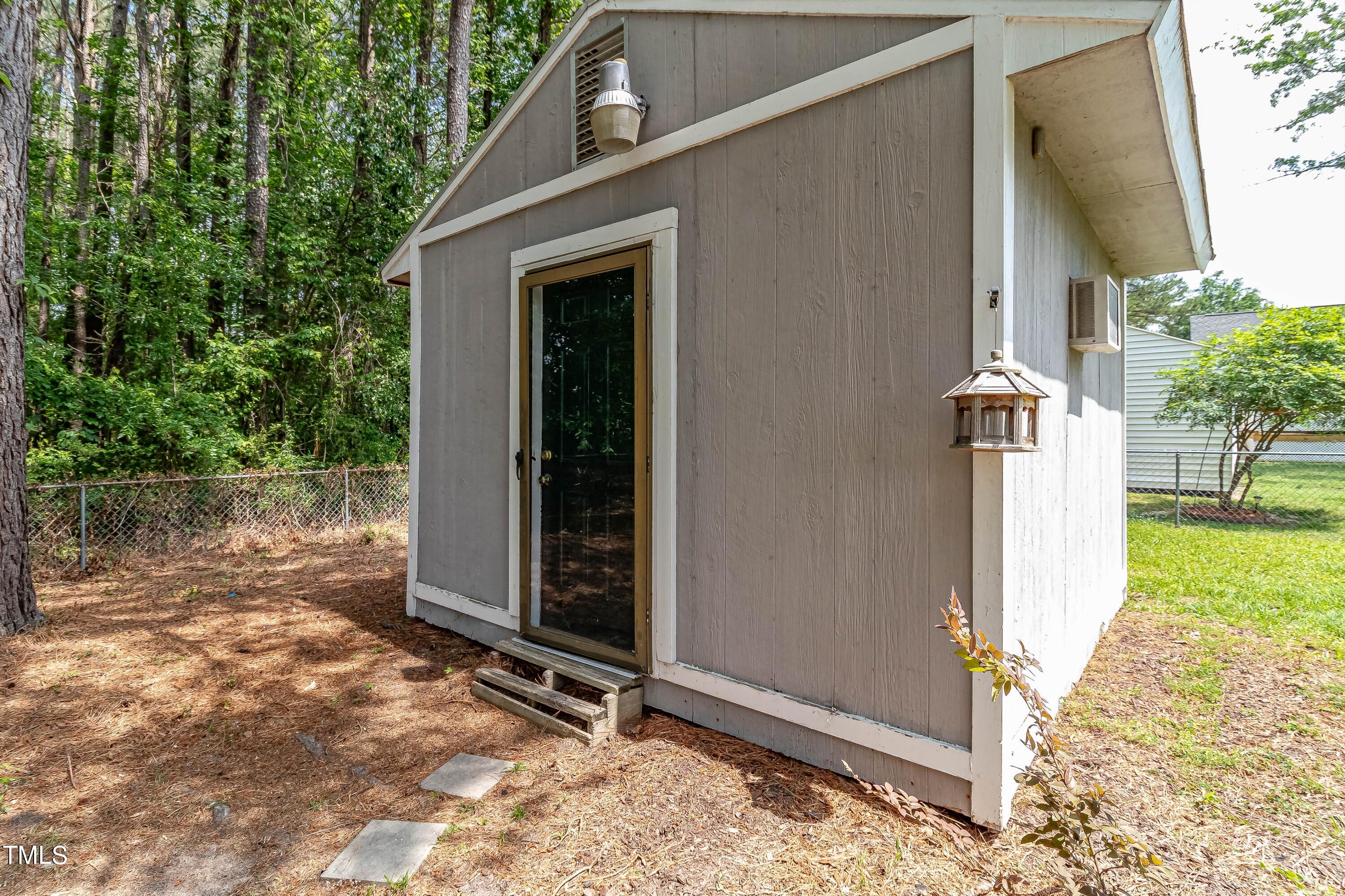 410 Barbour Road Smithfield, NC 27577 - Photo 13 of 16 a view of backyard with garden