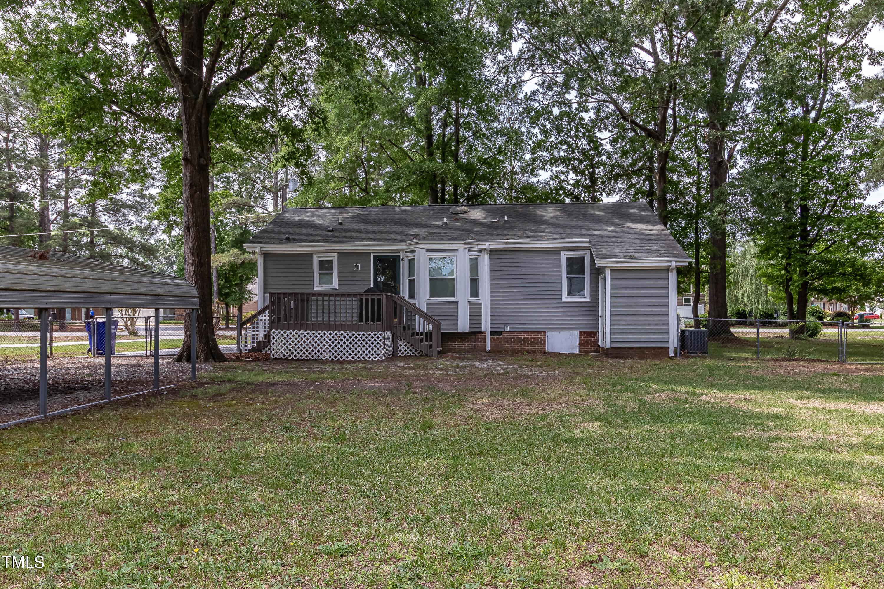 410 Barbour Road Smithfield, NC 27577 - Photo 16 of 16 a house view with a garden space
