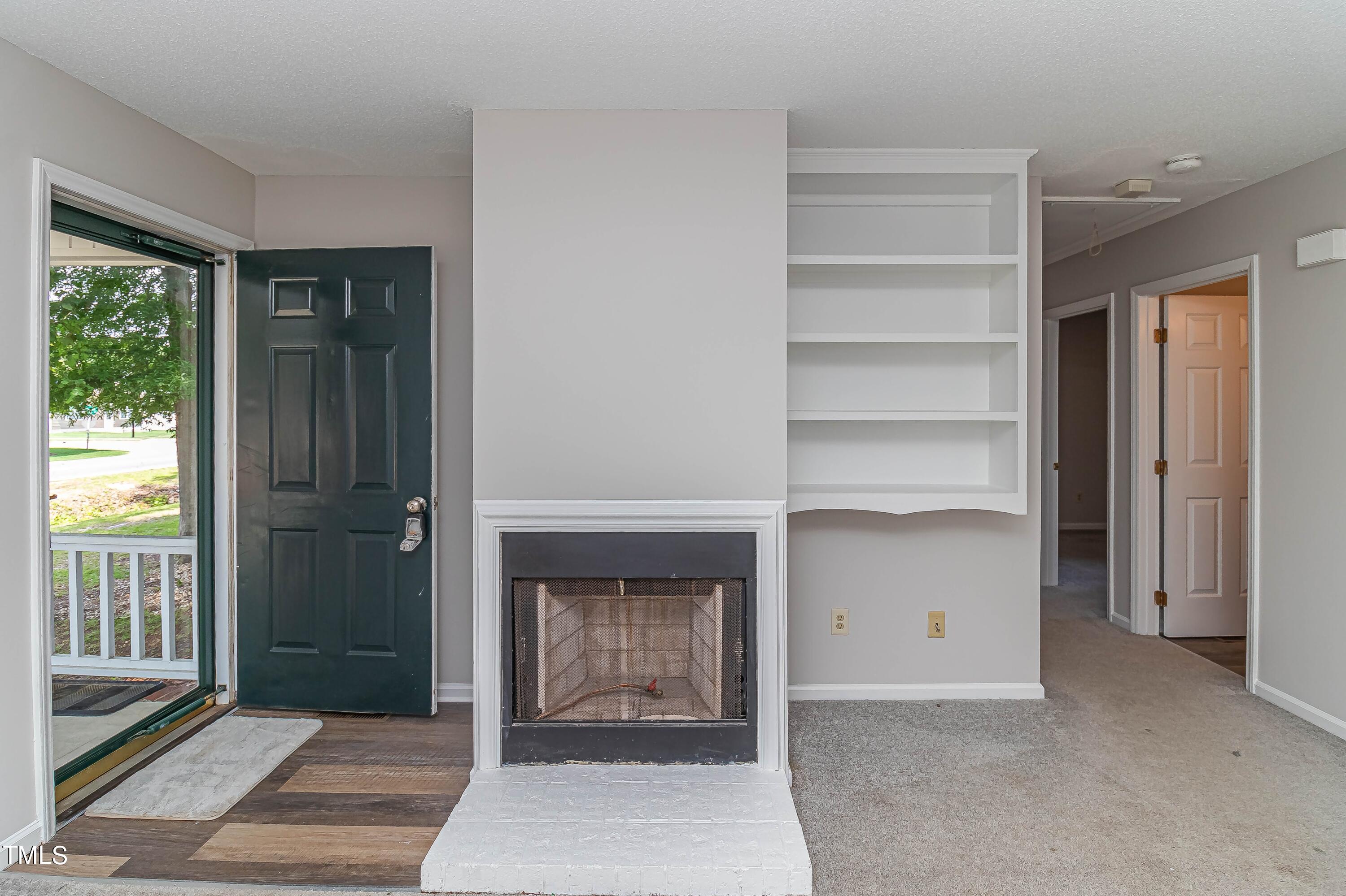410 Barbour Road Smithfield, NC 27577 - Photo 3 of 16 a view of an entryway with wooden floor and windows