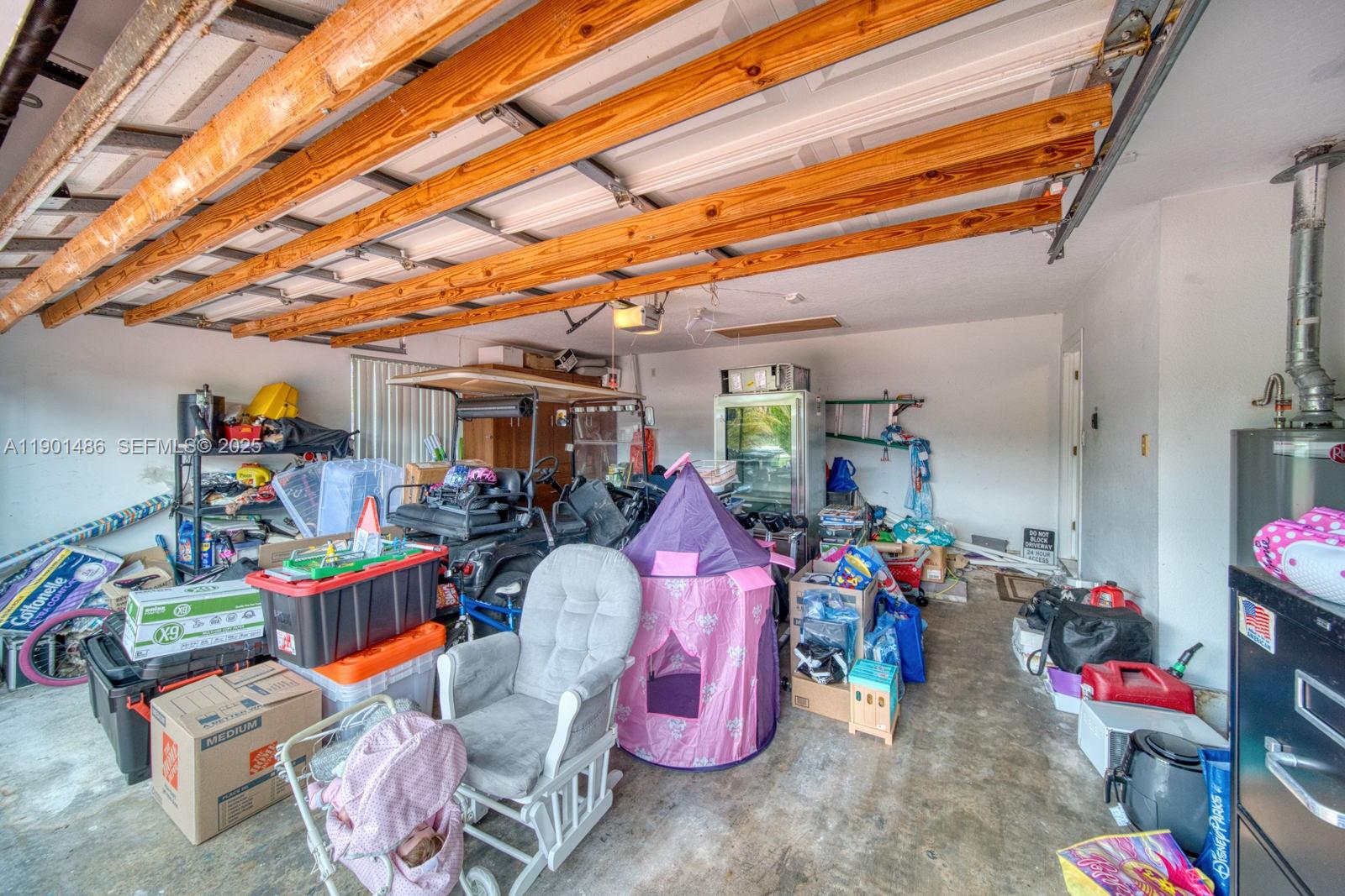 10860 Southwest 124th Road Miami, FL 33176 - Photo 27 of 47 a garage filled with lots of stuff