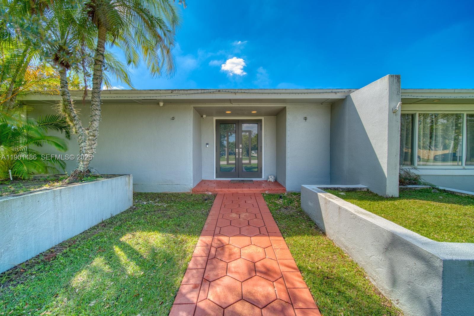 10860 Southwest 124th Road Miami, FL 33176 - Photo 3 of 47 a view of swimming pool with a yard
