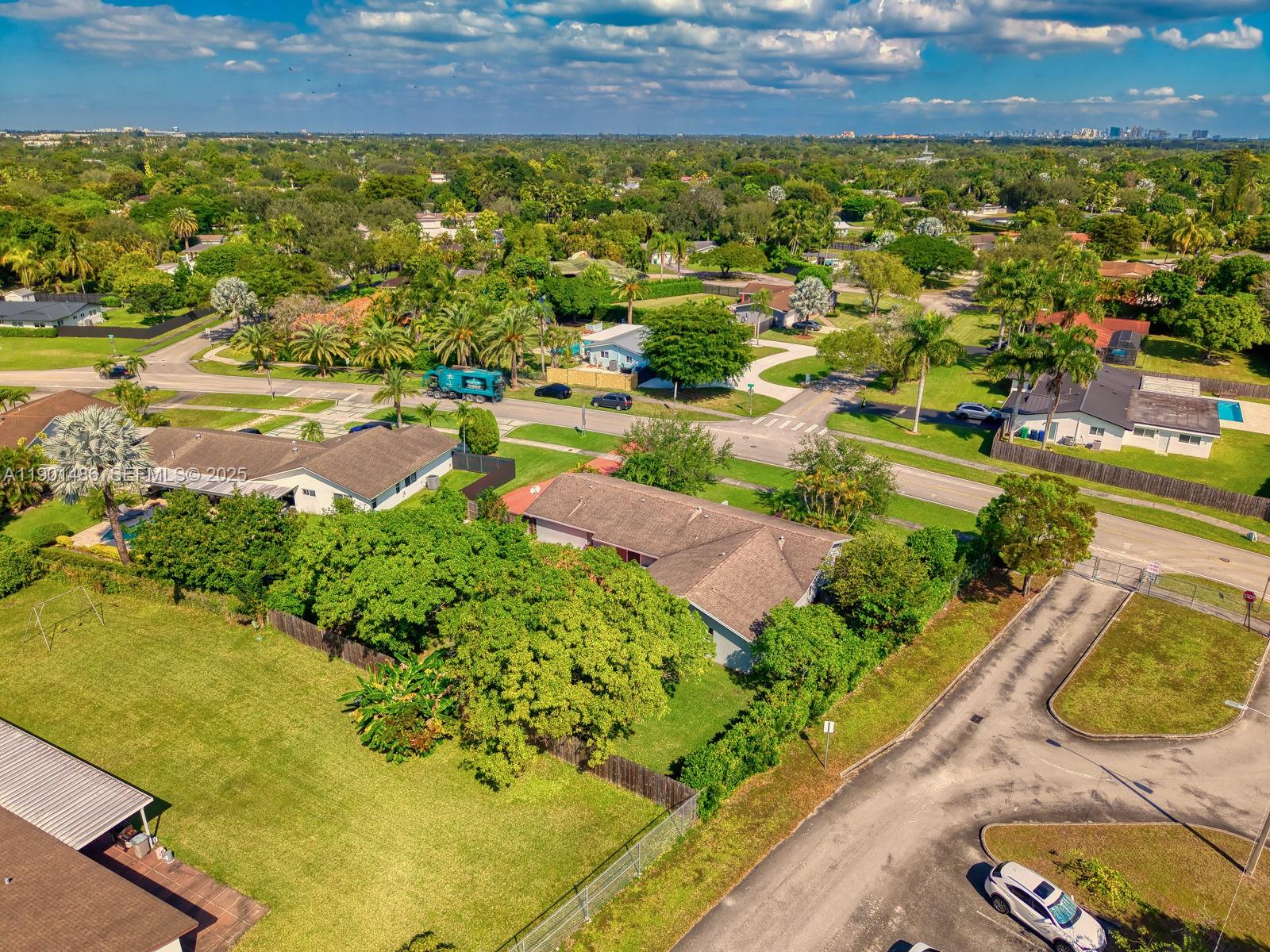 10860 Southwest 124th Road Miami, FL 33176 - Photo 37 of 47 an aerial view of residential houses with outdoor space
