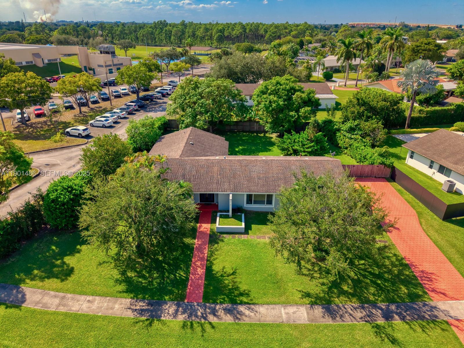 10860 Southwest 124th Road Miami, FL 33176 - Photo 39 of 47 an aerial view of a house with yard swimming pool and outdoor seating