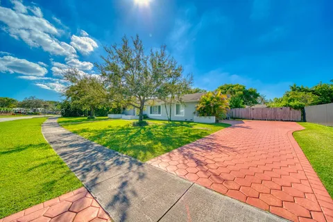 a view of a backyard with a garden