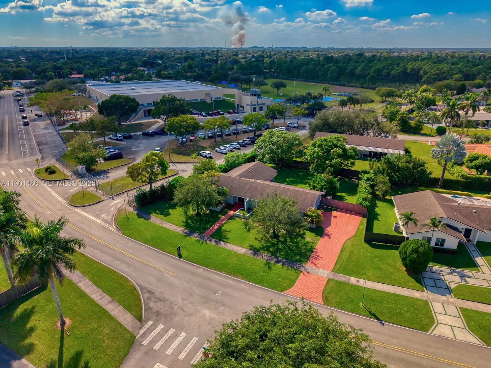 10860 Southwest 124th Road Miami, FL 33176 - Photo 45 of 47 an aerial view of a house with a garden