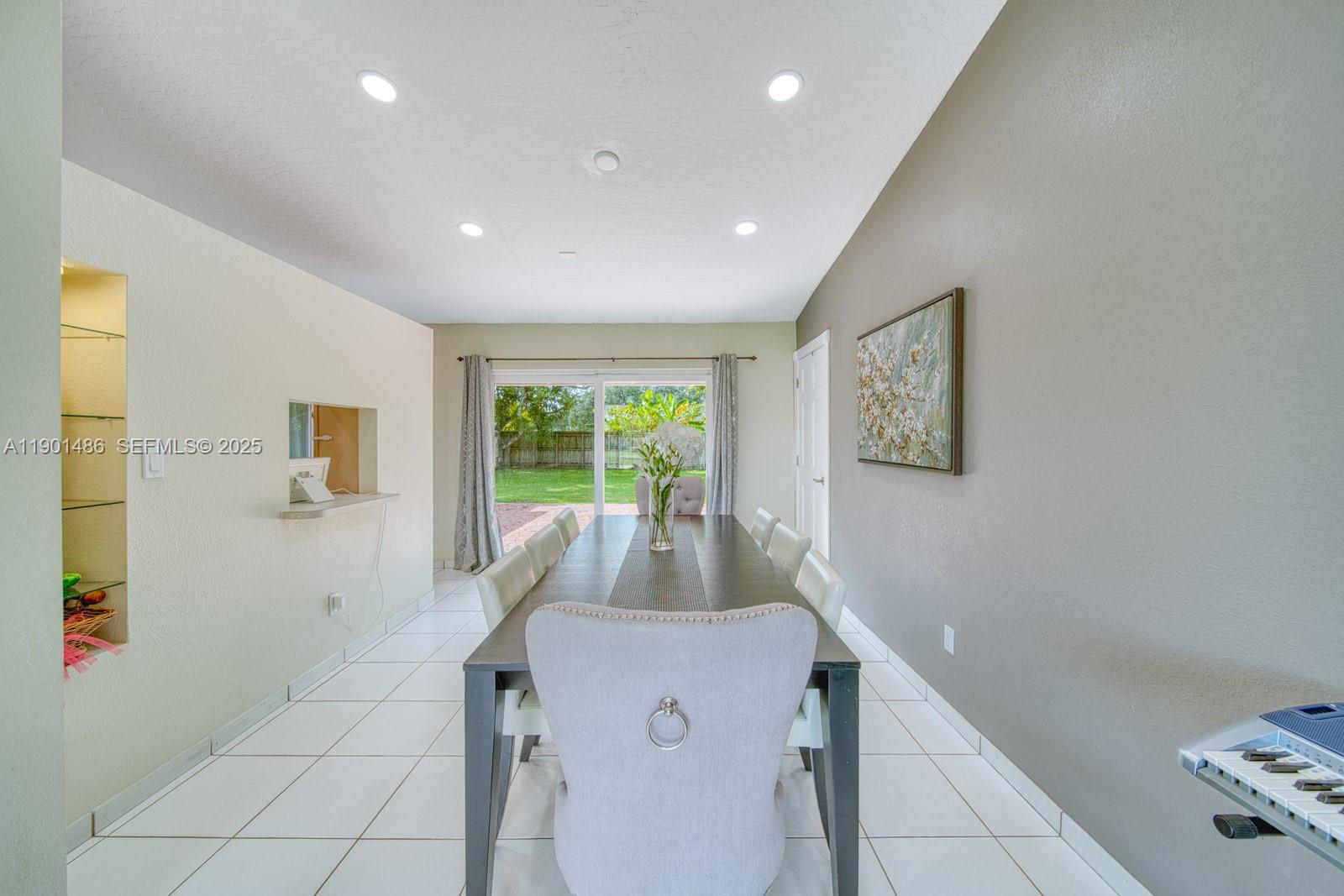 10860 Southwest 124th Road Miami, FL 33176 - Photo 8 of 47 a view of a livingroom with furniture and a window